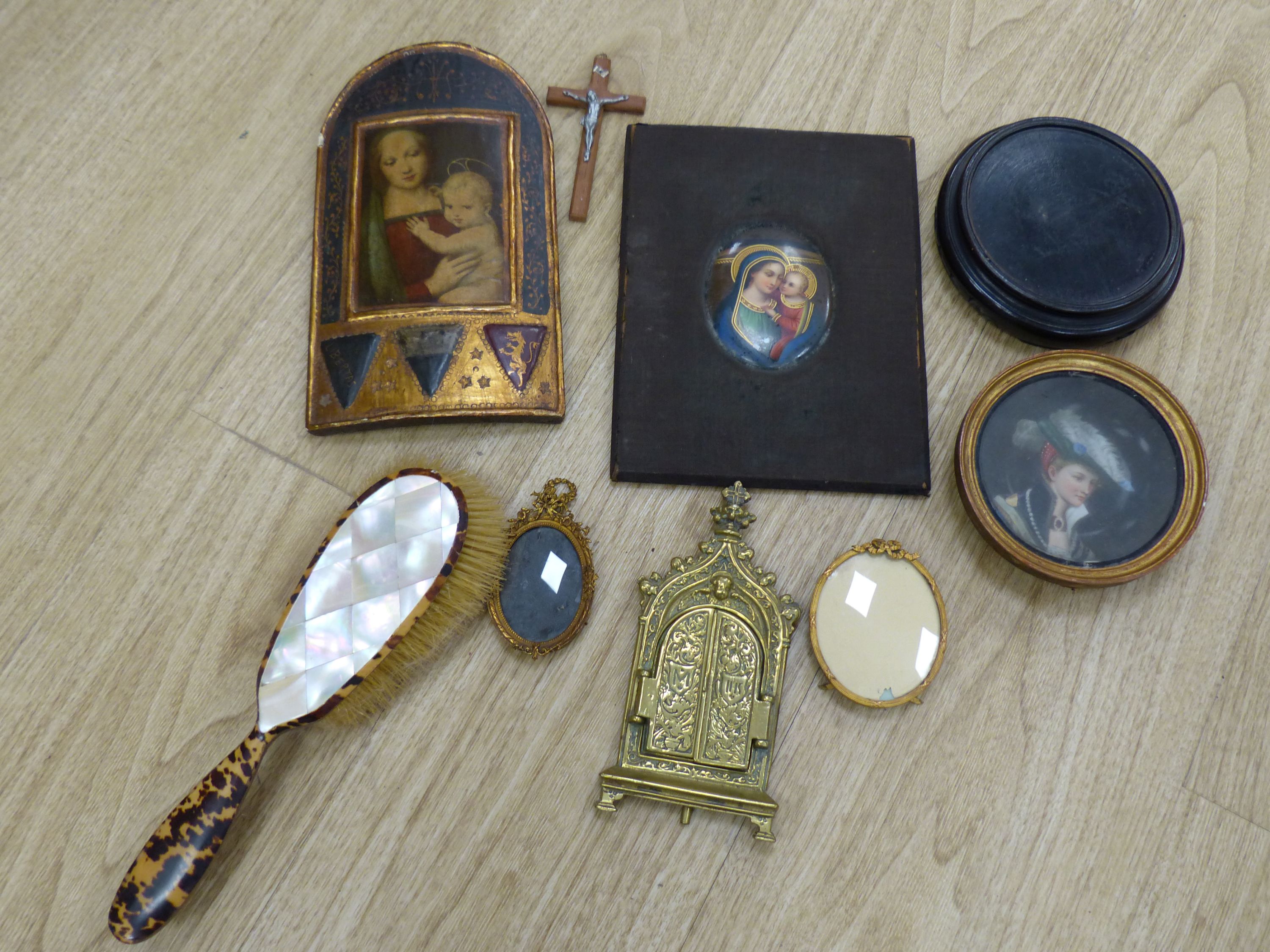 A quantity of mixed collectables to include a mother of pearl and faux tortoiseshell brush, a hardwood stand, an oval frame, a crucifix